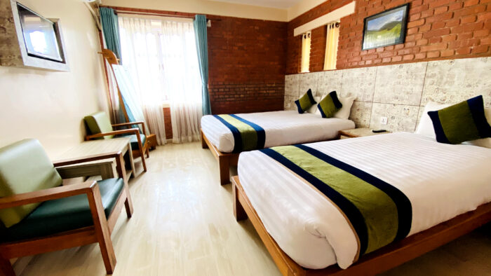 om-adhyay-deluxe-triple-room