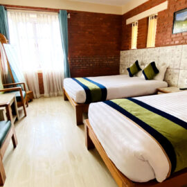 om-adhyay-deluxe-triple-room